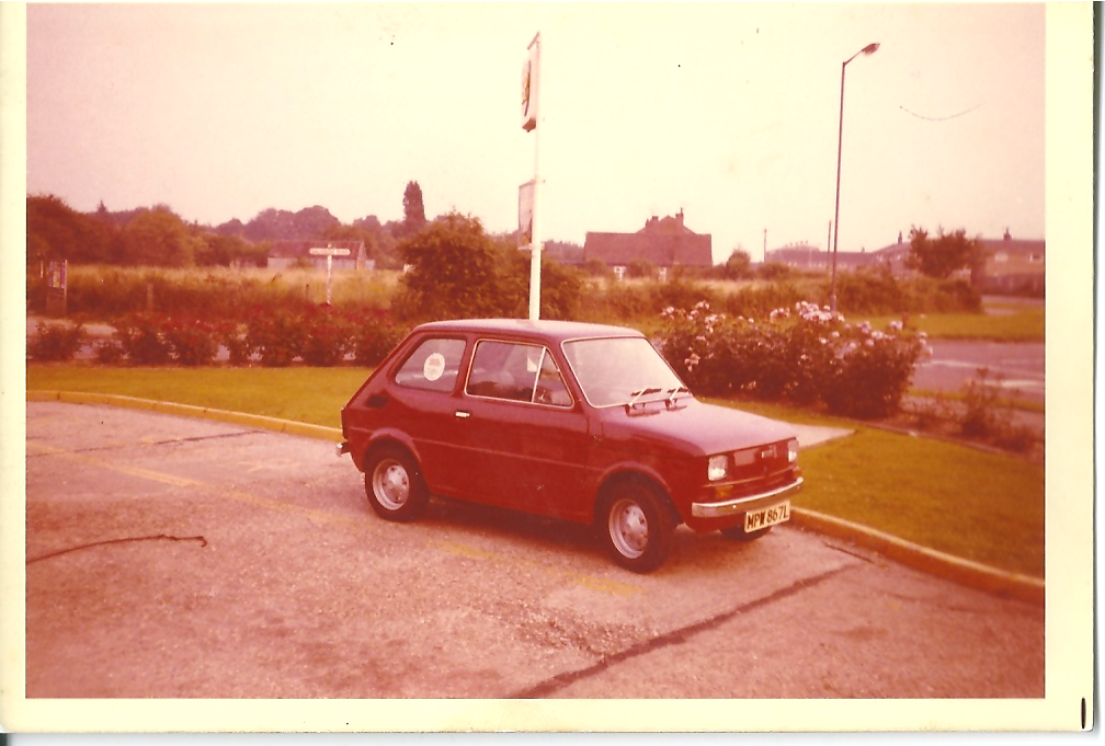  If anyone knows this area of Norwich (Salhouse Road) what’s most remarkable here is not the car (which is lovely but, sadly, it looks like it failed to survive through until MoT records were computerised) but the complete lack of housing estate. 