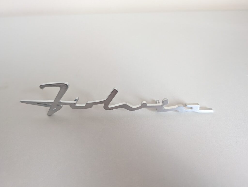 Lancia Fulvia coupe dash script badge
